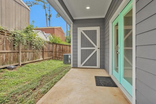 16850 Glenheath, Montgomery, TX 77316 - view of exterior entry featuring a patio