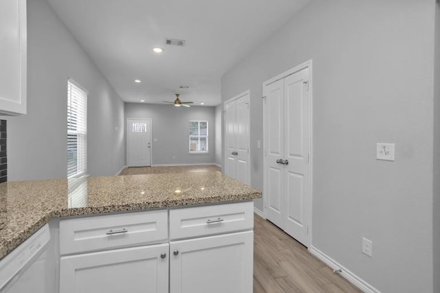 16850 Glenheath, Montgomery, TX 77316 - kitchen with dishwasher, white cabinetry, a ceiling fan, a peninsula, and recessed lighting
