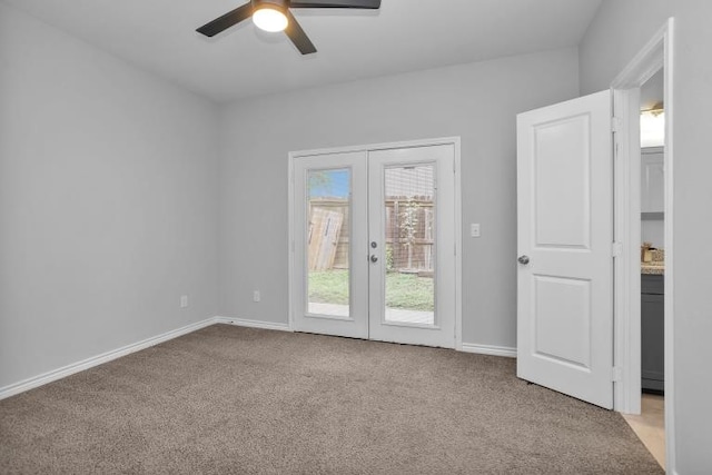 16850 Glenheath, Montgomery, TX 77316 - empty room featuring french doors, light colored carpet, and a ceiling fan
