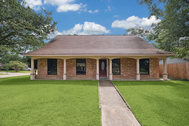 16810 Methil Dr, Spring, TX 77379 - view of front facade featuring a shingled roof, brick siding, and a porch