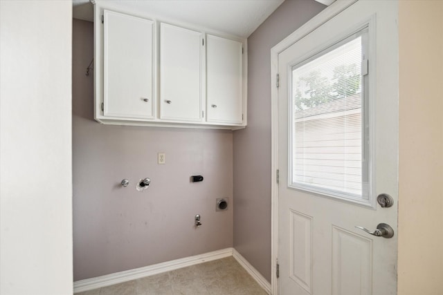 16810 Methil Dr, Spring, TX 77379 - laundry room featuring electric dryer hookup, hookup for a gas dryer, and cabinet space
