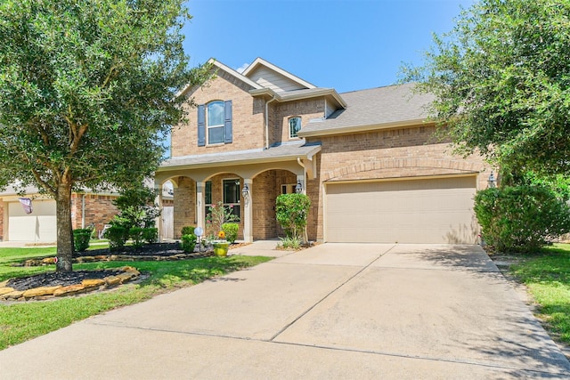 18002 Quarry Vale Dr, Cypress, TX 77429 - traditional-style house with brick siding, concrete driveway, a garage, and a porch