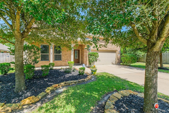 18002 Quarry Vale Dr, Cypress, TX 77429 - obstructed view of property with concrete driveway, a garage, and brick siding