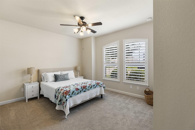 12015 Obsidian Ln, Dayton, TX 77535 - carpeted bedroom featuring ceiling fan and baseboards