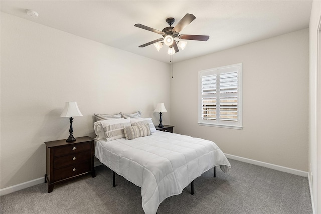 12015 Obsidian Ln, Dayton, TX 77535 - carpeted bedroom with baseboards and a ceiling fan