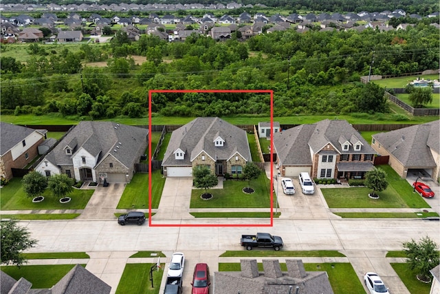 12015 Obsidian Ln, Dayton, TX 77535 - aerial perspective of suburban area with property parcel outlined