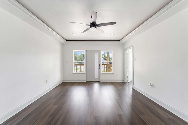 102 Glendale St, Houston, TX 77012 - empty room featuring a ceiling fan, dark wood finished floors, recessed lighting, and a raised ceiling