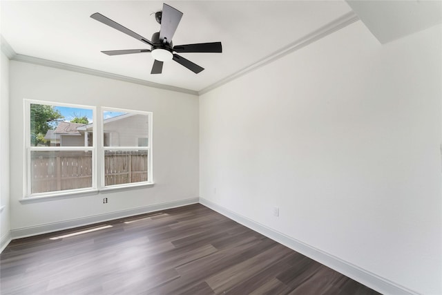 102 Glendale St, Houston, TX 77012 - unfurnished room featuring dark wood finished floors, ornamental molding, and a ceiling fan