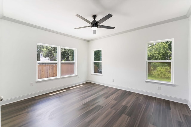 102 Glendale St, Houston, TX 77012 - spare room with dark wood-style floors, crown molding, and ceiling fan