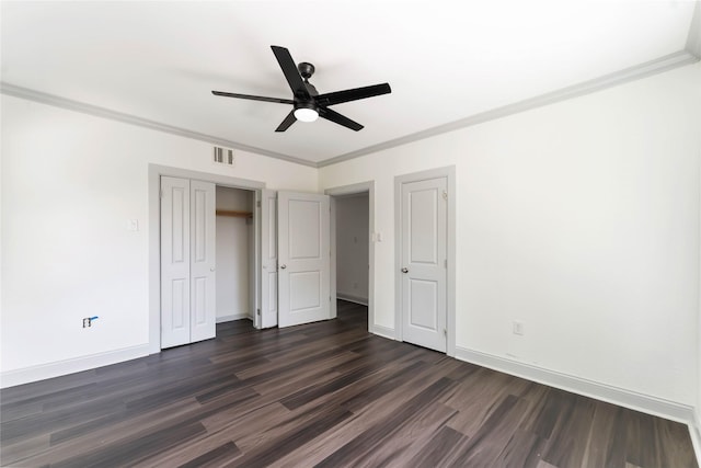 102 Glendale St, Houston, TX 77012 - unfurnished bedroom with dark wood-type flooring, crown molding, a closet, and ceiling fan