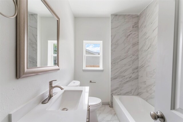 102 Glendale St, Houston, TX 77012 - full bathroom featuring marble look tile flooring, vanity, and shower / washtub combination