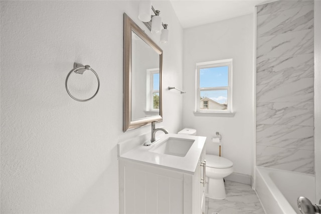 102 Glendale St, Houston, TX 77012 - full bathroom featuring marble look tiles, vanity, and shower / bathtub combination