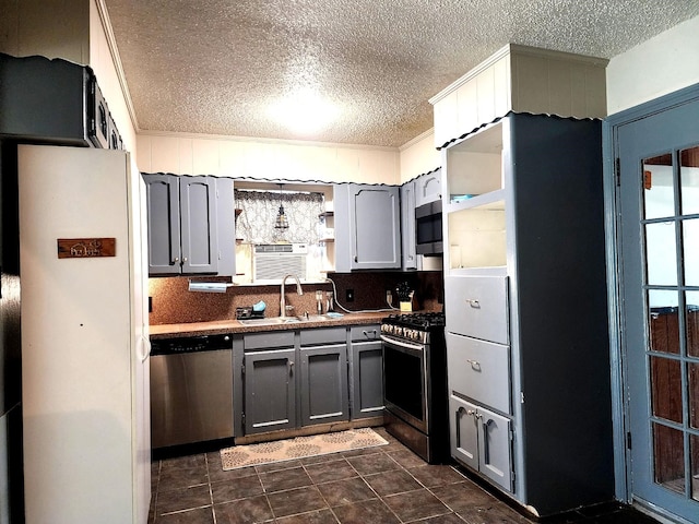 505 Allen Ct, Alvin, TX 77511 - kitchen with stainless steel appliances, a textured ceiling, tasteful backsplash, gray cabinets, and open shelves