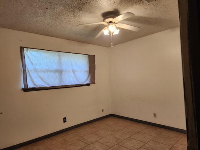 505 Allen Ct, Alvin, TX 77511 - empty room with a textured ceiling, a ceiling fan, and light tile patterned floors