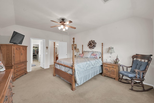 30302 Castle Forest Dr, Spring, TX 77386 - bedroom with vaulted ceiling, light carpet, ceiling fan, and connected bathroom