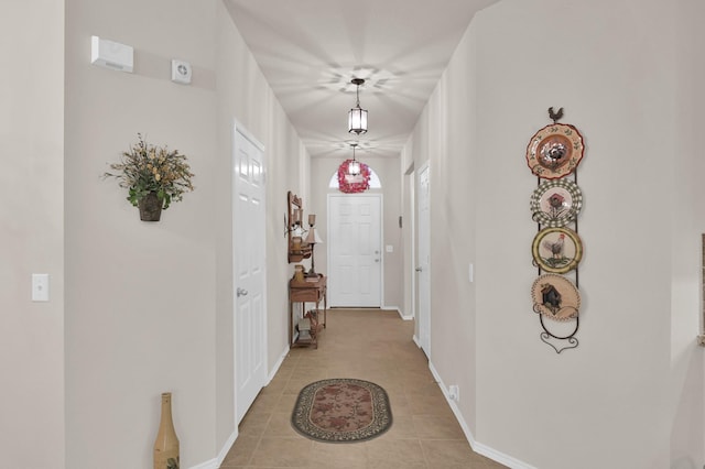 30302 Castle Forest Dr, Spring, TX 77386 - entryway featuring light tile patterned floors and baseboards