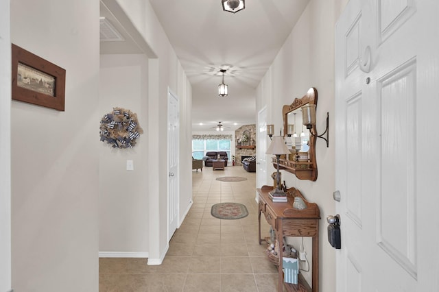 30302 Castle Forest Dr, Spring, TX 77386 - hall featuring light tile patterned floors and baseboards