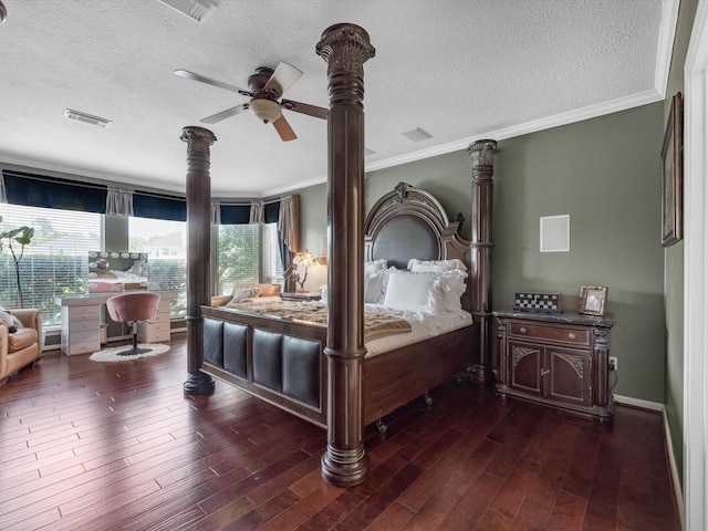 11938 Galentine Pt, Cypress, TX 77429 - bedroom with a textured ceiling, dark wood finished floors, and crown molding