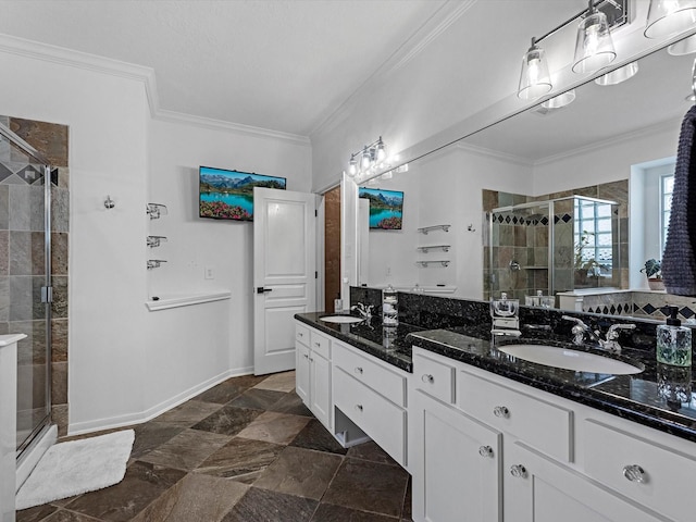 11938 Galentine Pt, Cypress, TX 77429 - bathroom with a stall shower, double vanity, stone finish floors, and ornamental molding