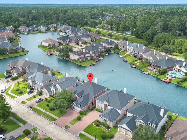 11938 Galentine Pt, Cypress, TX 77429 - aerial perspective of suburban area with a heavily wooded area and a nearby body of water