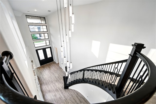 18011 Brazos River Cir, Cypress, TX 77433 - entrance foyer with wood finished floors, french doors, and recessed lighting