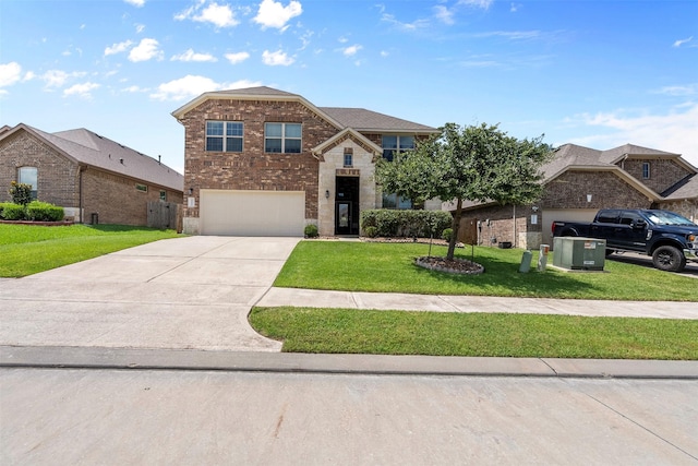 12137 Pearl Bay Ln, Conroe, TX 77304 - view of front of home featuring driveway, a front lawn, an attached garage, and brick siding