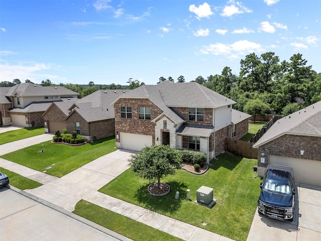 12137 Pearl Bay Ln, Conroe, TX 77304 - traditional home with brick siding, driveway, stone siding, and roof with shingles