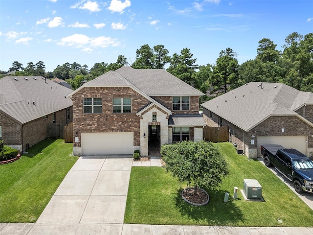 12137 Pearl Bay Ln, Conroe, TX 77304 - view of front of home with concrete driveway, brick siding, stone siding, a garage, and roof with shingles