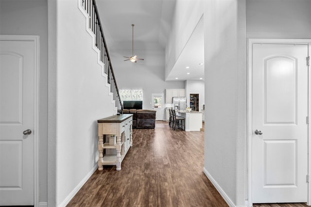 12137 Pearl Bay Ln, Conroe, TX 77304 - hall featuring dark wood finished floors and stairs