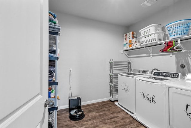 12137 Pearl Bay Ln, Conroe, TX 77304 - washroom featuring washing machine and dryer and dark wood-style floors