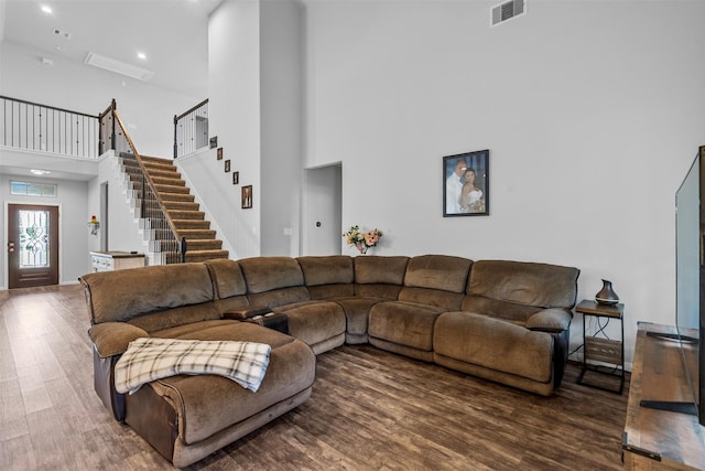 12137 Pearl Bay Ln, Conroe, TX 77304 - living room with a towering ceiling, wood finished floors, stairs, and recessed lighting