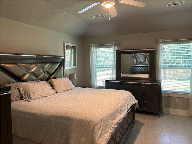 23918 Overcup Dr, Spring, TX 77389 - bedroom with lofted ceiling, light wood finished floors, and ceiling fan