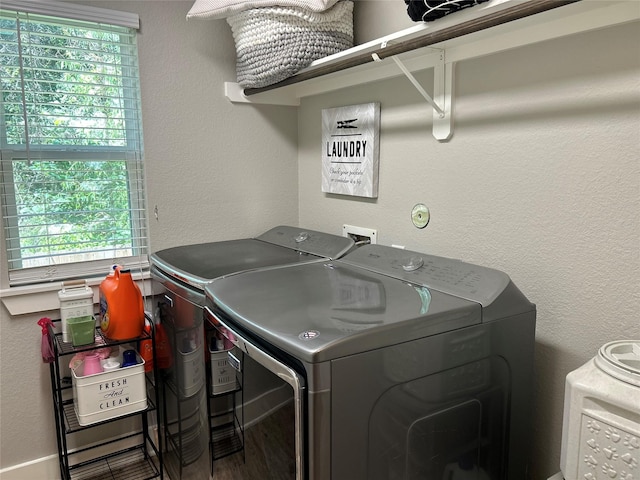 23918 Overcup Dr, Spring, TX 77389 - laundry room featuring separate washer and dryer and wood finished floors