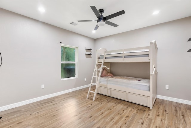 24824 W Christine Dr, Splendora, TX 77372 - bedroom with light wood-style floors, ceiling fan, and recessed lighting