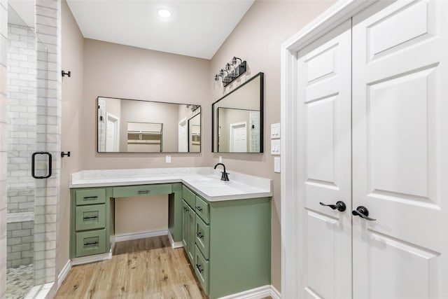 24824 W Christine Dr, Splendora, TX 77372 - full bathroom with vanity, a stall shower, and wood finished floors