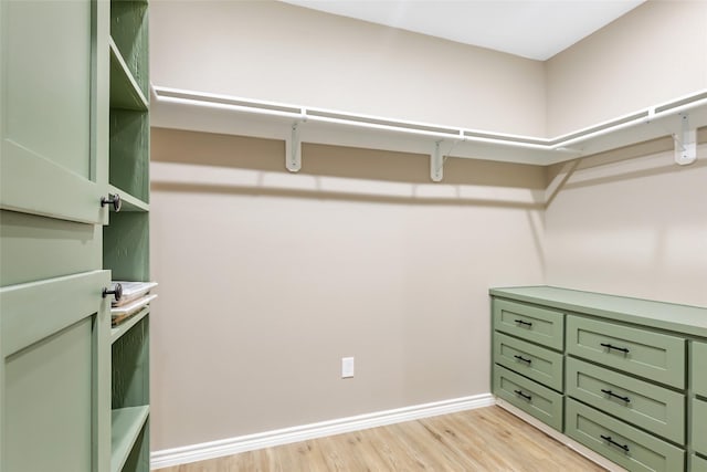 24824 W Christine Dr, Splendora, TX 77372 - walk in closet with light wood-style floors
