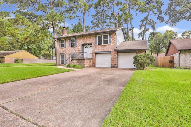 3203 Sycamore Springs Dr, Kingwood, TX 77339 - split foyer home featuring driveway, a chimney, brick siding, and an attached garage