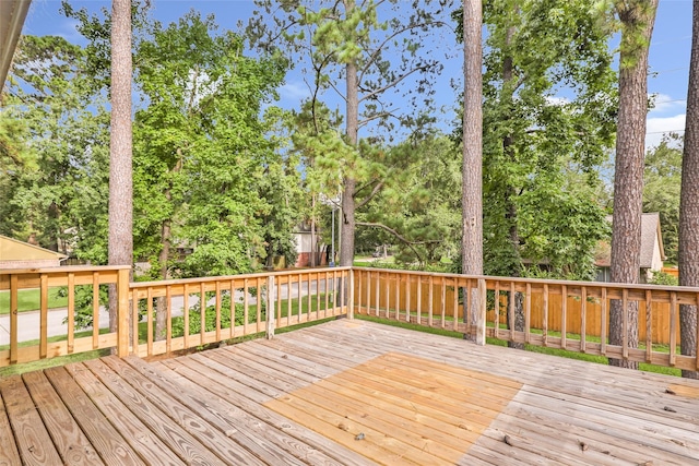 3203 Sycamore Springs Dr, Kingwood, TX 77339 - wooden terrace featuring view of wooded area