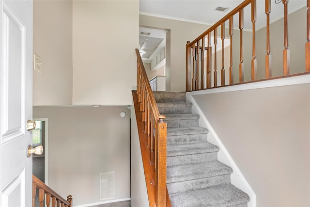 3203 Sycamore Springs Dr, Kingwood, TX 77339 - stairs featuring ornamental molding