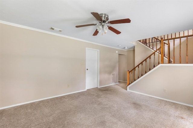3203 Sycamore Springs Dr, Kingwood, TX 77339 - unfurnished living room featuring ceiling fan, carpet flooring, and crown molding