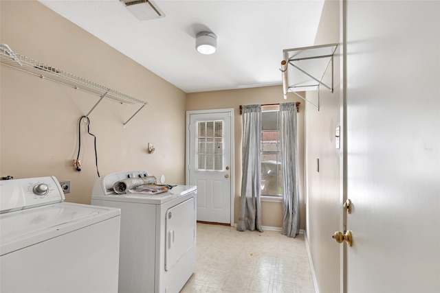 3203 Sycamore Springs Dr, Kingwood, TX 77339 - laundry area with independent washer and dryer and light flooring