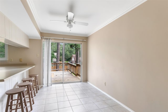 3203 Sycamore Springs Dr, Kingwood, TX 77339 - dining space featuring ceiling fan, crown molding, and light tile patterned flooring