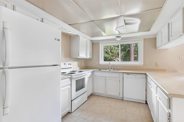 3203 Sycamore Springs Dr, Kingwood, TX 77339 - kitchen featuring white appliances, light countertops, white cabinetry, and light tile patterned flooring