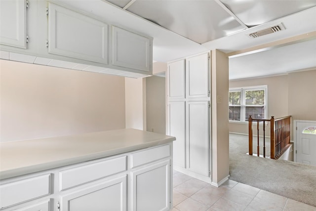3203 Sycamore Springs Dr, Kingwood, TX 77339 - walk in closet featuring light tile patterned floors and light carpet