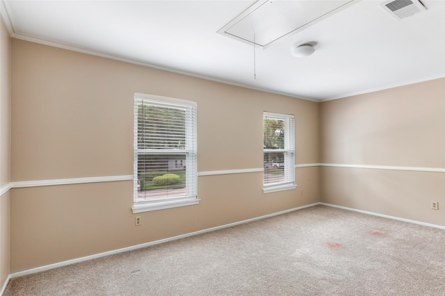3203 Sycamore Springs Dr, Kingwood, TX 77339 - unfurnished room featuring attic access, carpet flooring, and ornamental molding