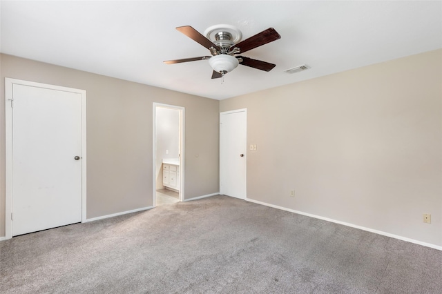 3203 Sycamore Springs Dr, Kingwood, TX 77339 - unfurnished bedroom featuring carpet floors, connected bathroom, and ceiling fan
