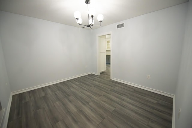 17106 Spring Creek Forest Dr, Spring, TX 77379 - unfurnished room featuring a chandelier and dark wood finished floors
