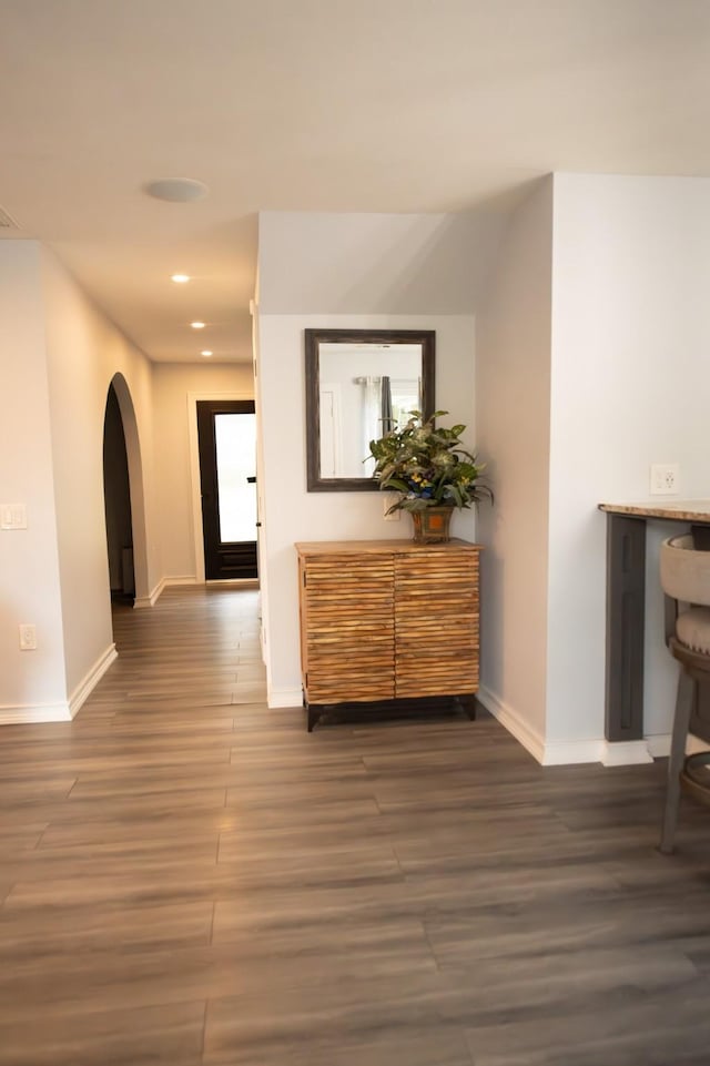 17106 Spring Creek Forest Dr, Spring, TX 77379 - hallway with recessed lighting, wood finished floors, and arched walkways