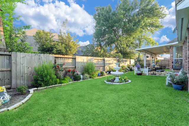 4714 Schiller Park Ln, Sugar Land, TX 77479 - fenced backyard with a patio area
