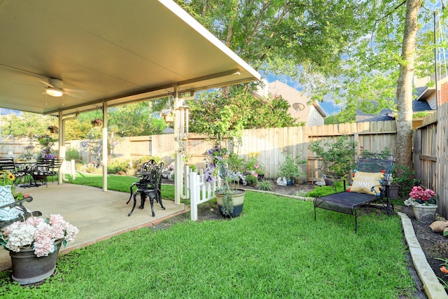 4714 Schiller Park Ln, Sugar Land, TX 77479 - fenced backyard featuring ceiling fan and a patio